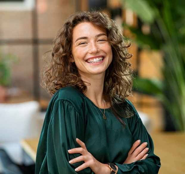 Smiling woman representing cosmetic dentistry treatment